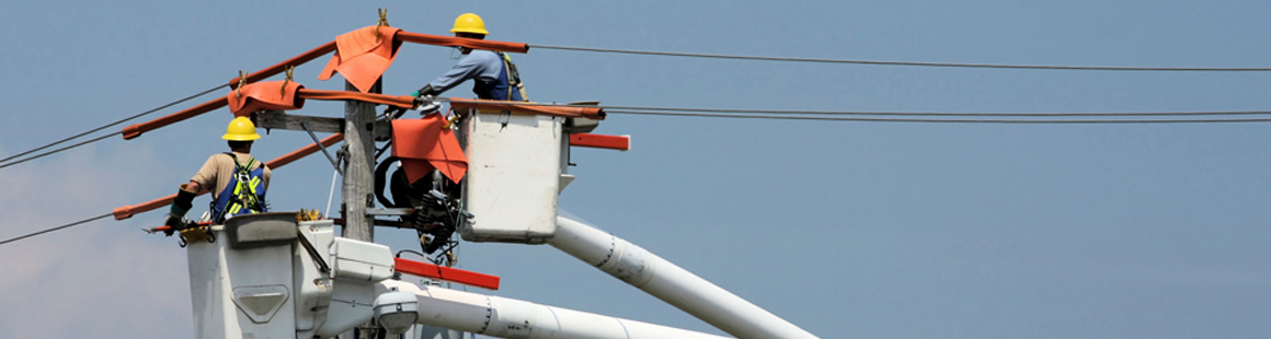 Men_working_in_bucket_truck_on_powerline